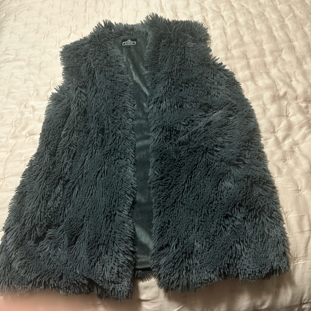 Like new knee length shaggy fluffy vest.